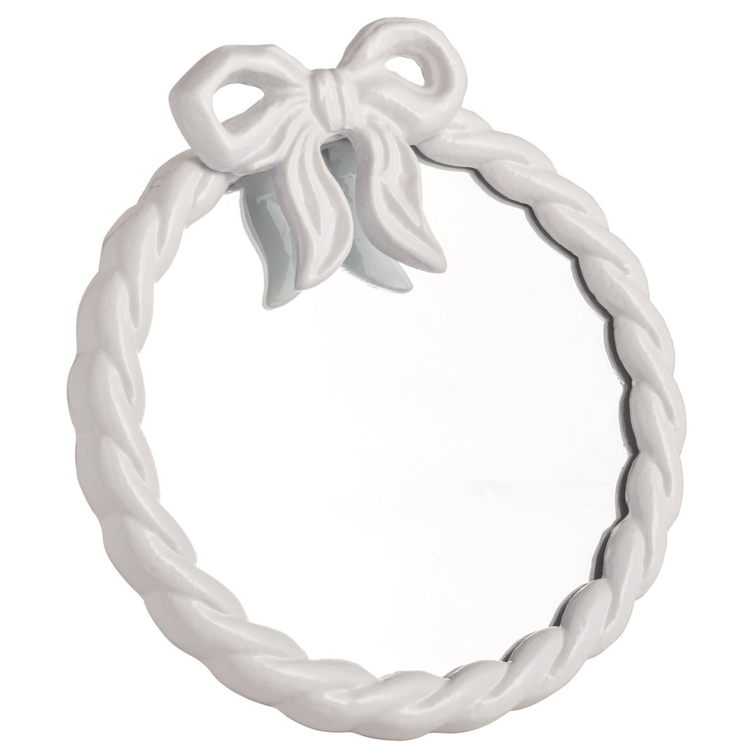 White twist framed mirror with a bow at the top