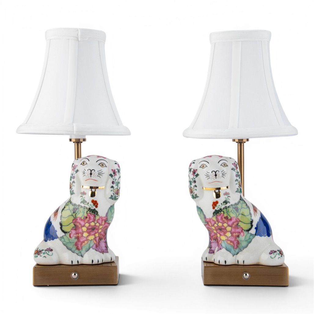 Pair of floral ceramic dog table lamps with white shades shown from the front | Walker Boutique