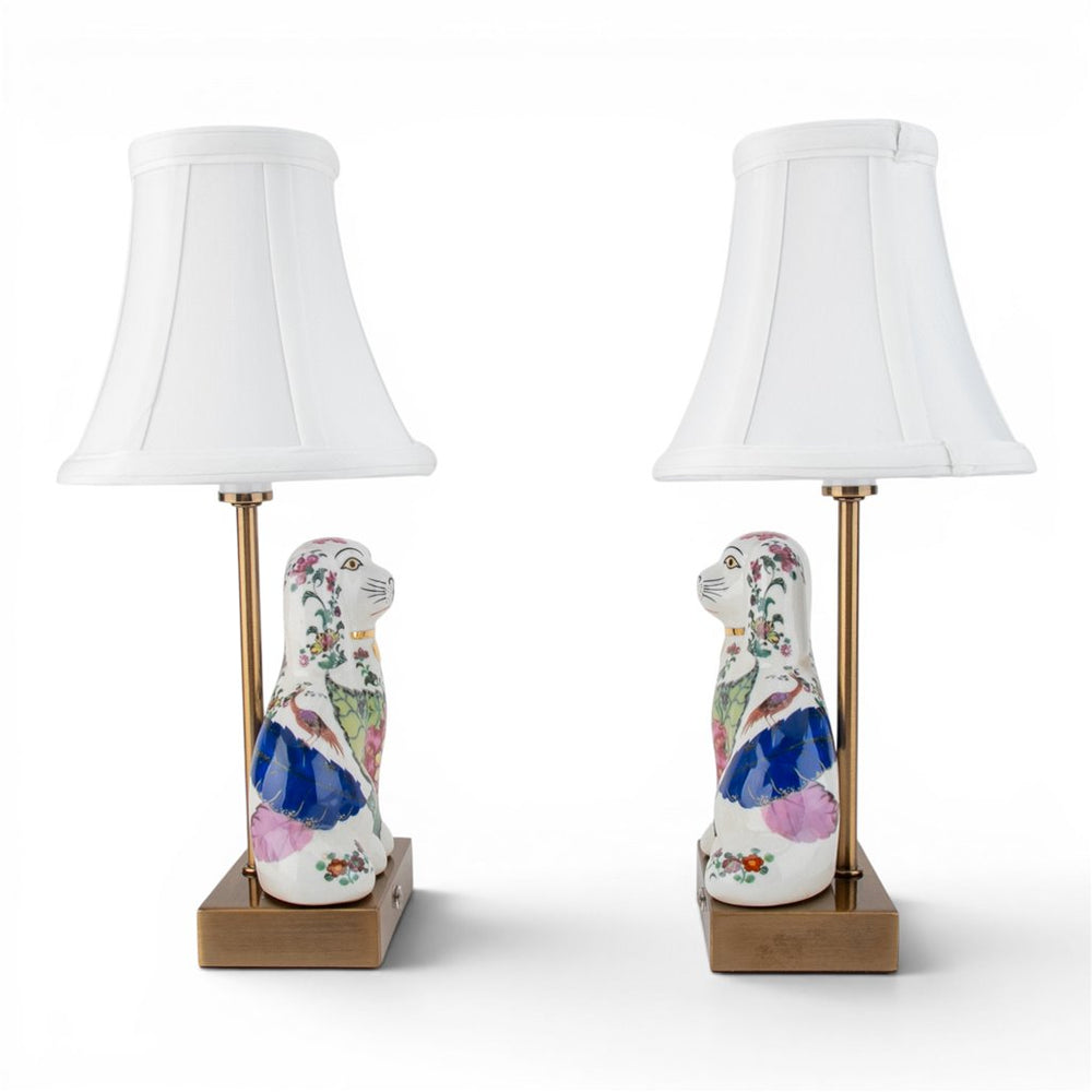 Pair of floral ceramic dog table lamps with white shades shown from the side | Walker Boutique