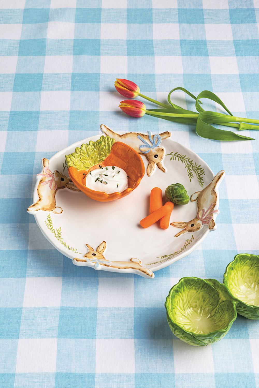 Glazed stoneware bunny chip server. Comes with hand-painted carrot dip bowl. ON BLUE GINGHAM TABLE CLOTH