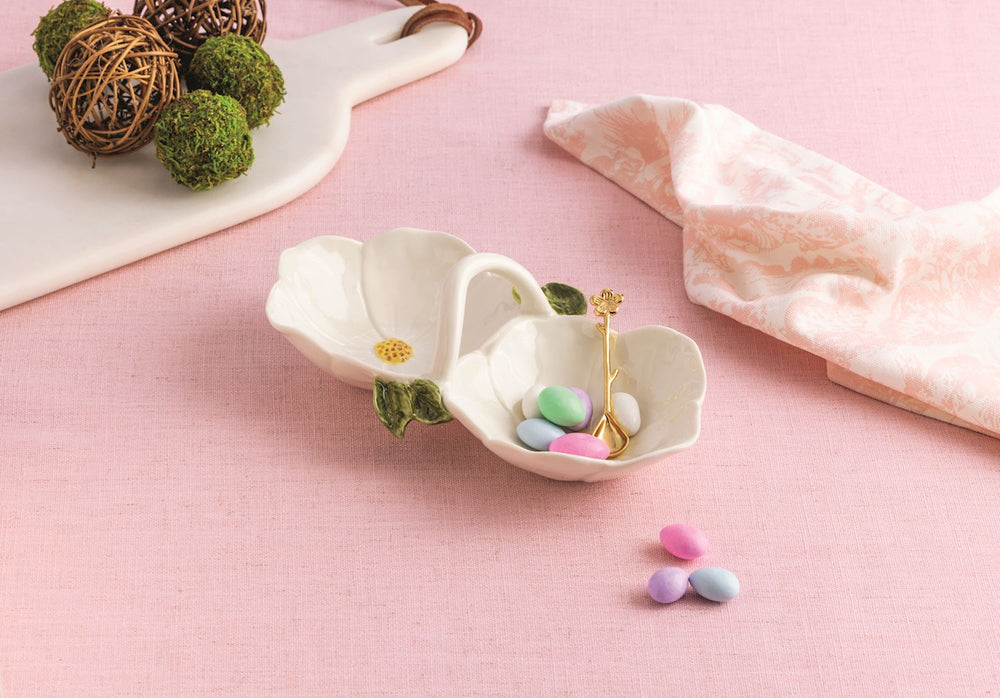 WHITE FLOWER DOUBLE TIDBIT SET ON PINK TABLECLOTH  WITH CANDY EGGS