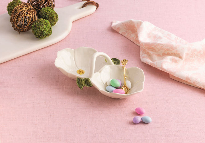 WHITE FLOWER DOUBLE TIDBIT SET ON PINK TABLECLOTH  WITH CANDY EGGS