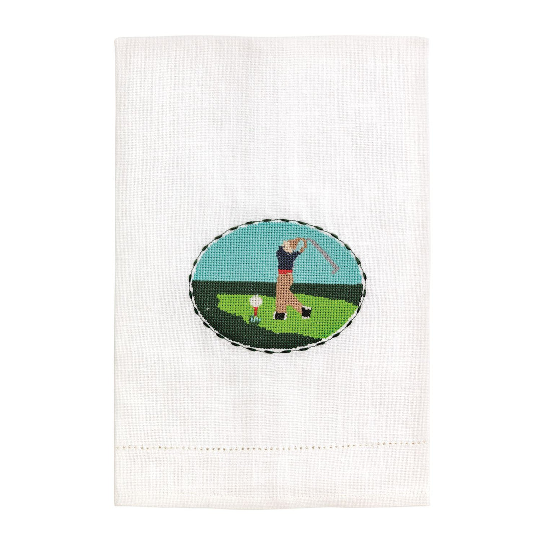 WHITE TOWEL WITH NEEDLEPOINT GOLF MOTIF IN CENTER