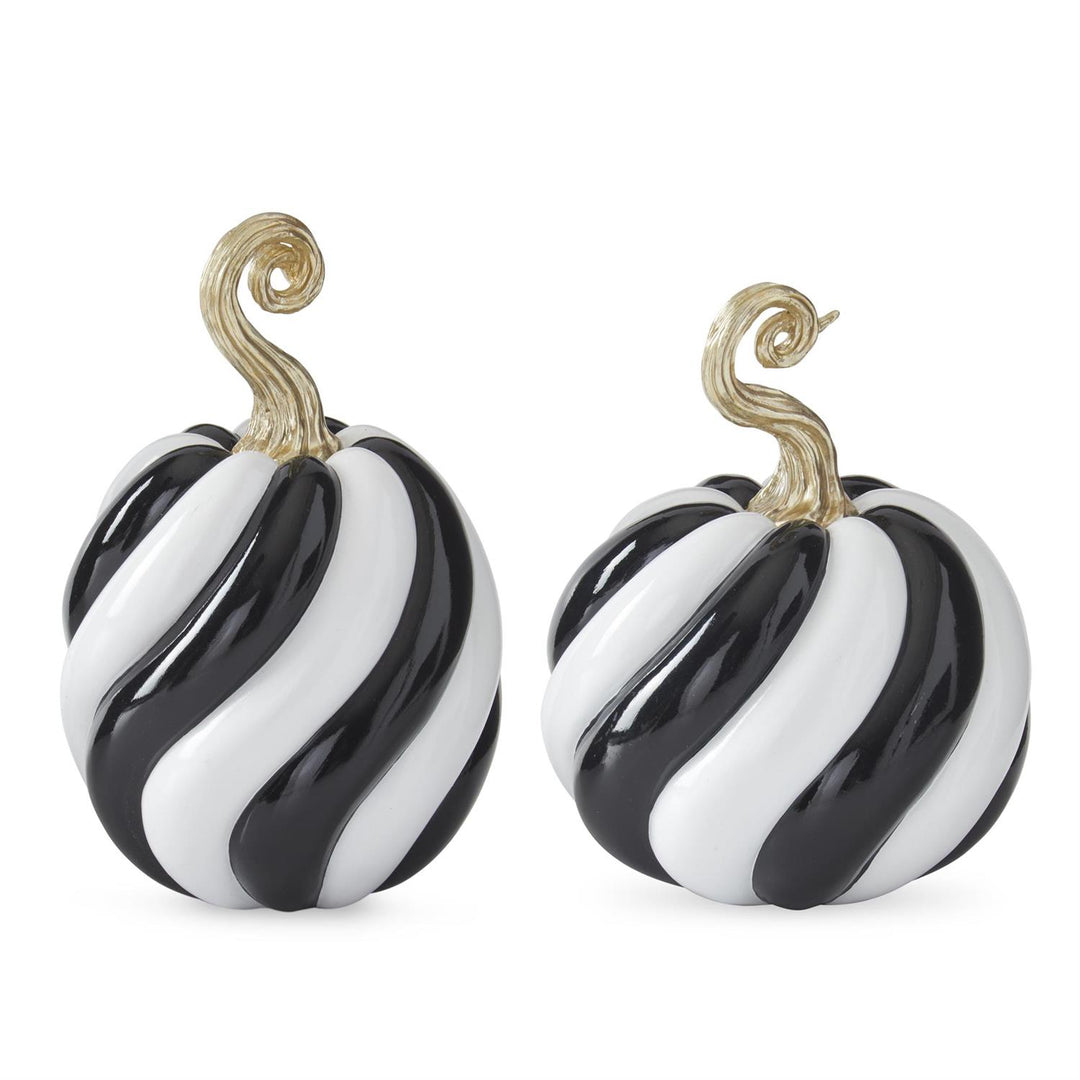 Black and white striped earrings with gold accents on a white background