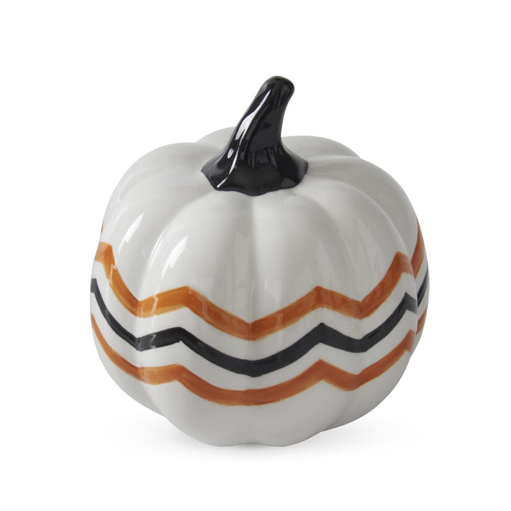 Decorative pumpkin with orange and black stripes on a white background