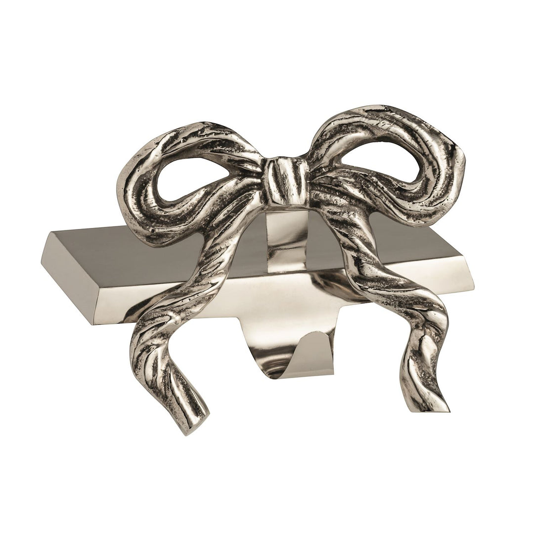 silver stocking holder in a bow shape