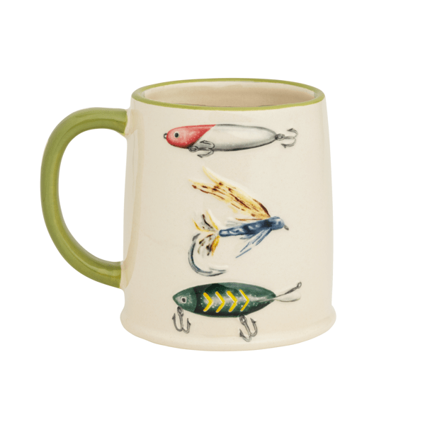 CREAM MUG WITH GREEN HANDLE WITH FISHING LURES ON SIDE
