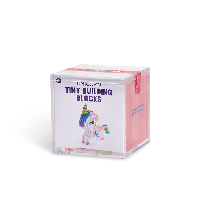 Box of unicorn-themed tiny building blocks on a white background