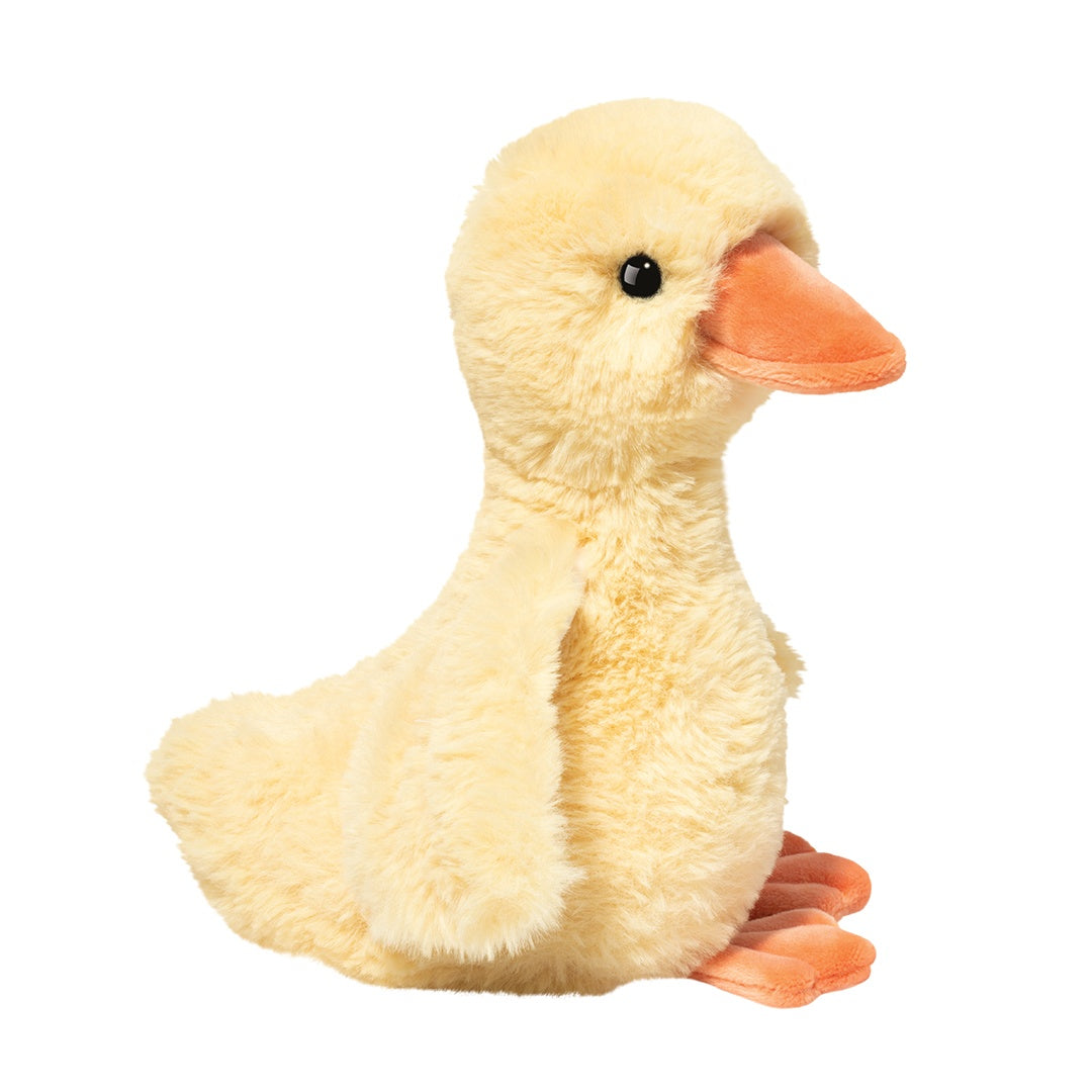 Yellow duckling plush toy with soft fluffy fur, an orange beak, and orange feet, shown in a side profile pose | Walker Boutique