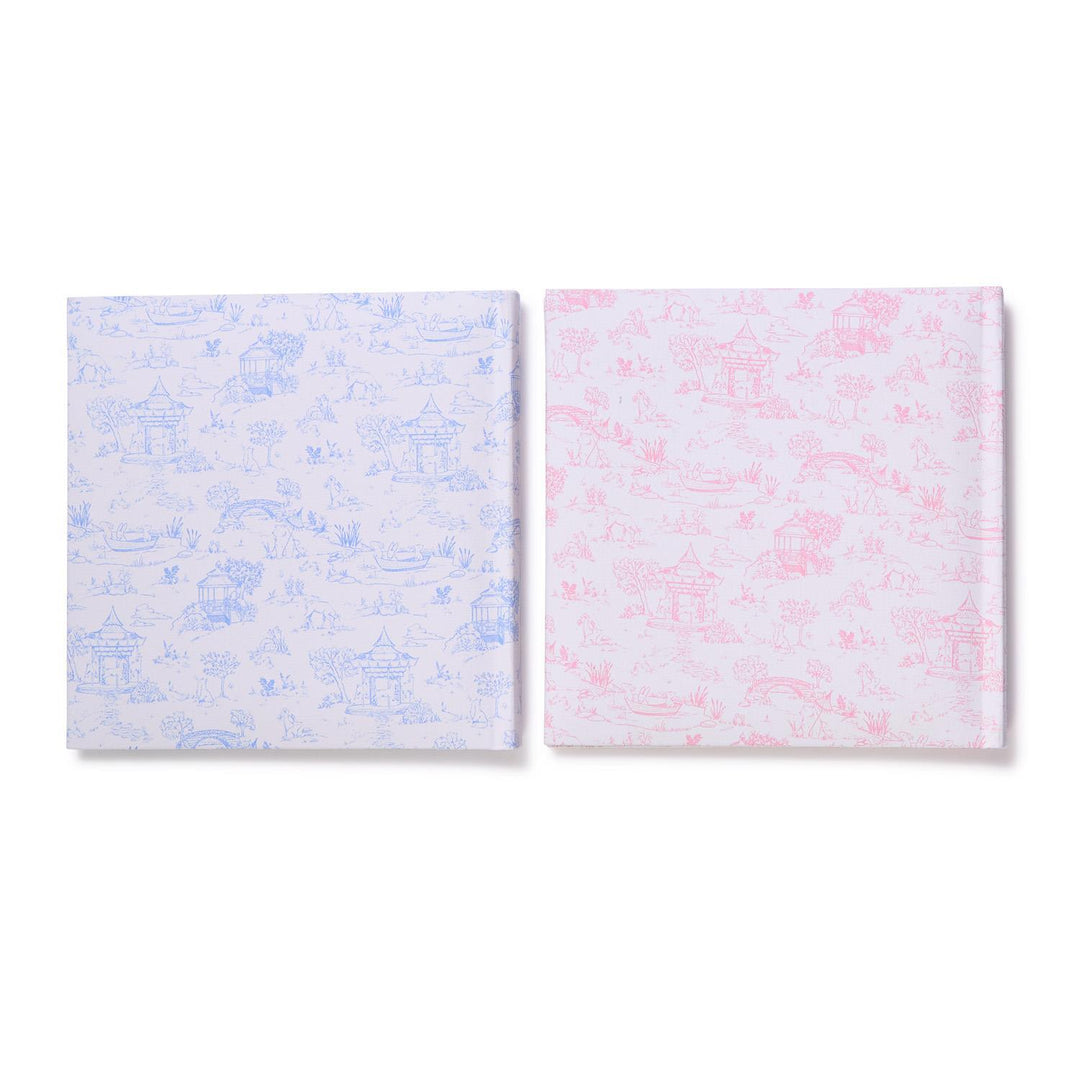 Two square photo albums with abstract patterns on a white background