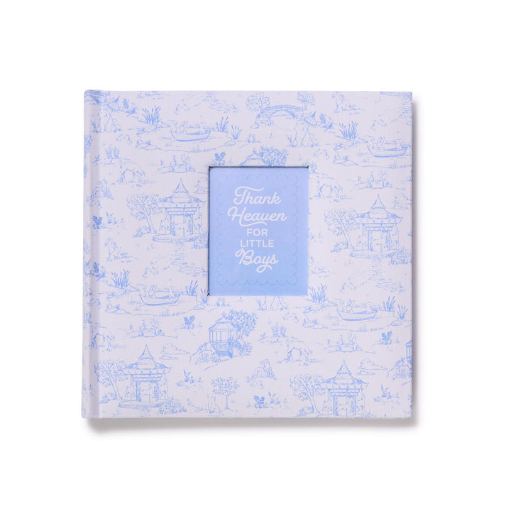 Decorative album with blue text and pattern on a white background