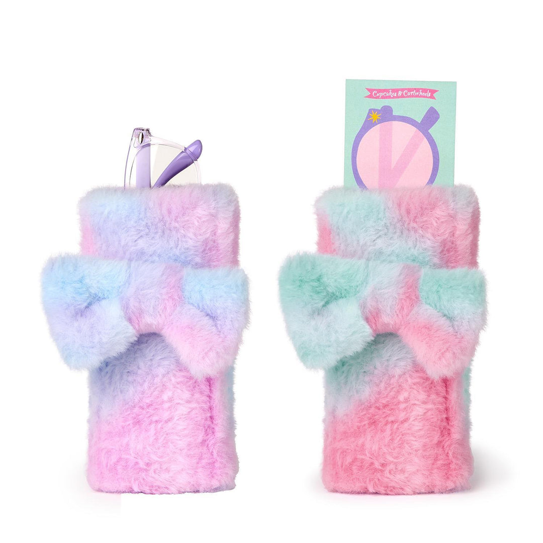Two colorful fuzzy phone cases with a brand label on a white background