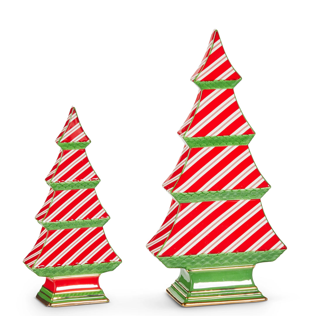 Two Christmas tree figurines with red and white striped design on a white background