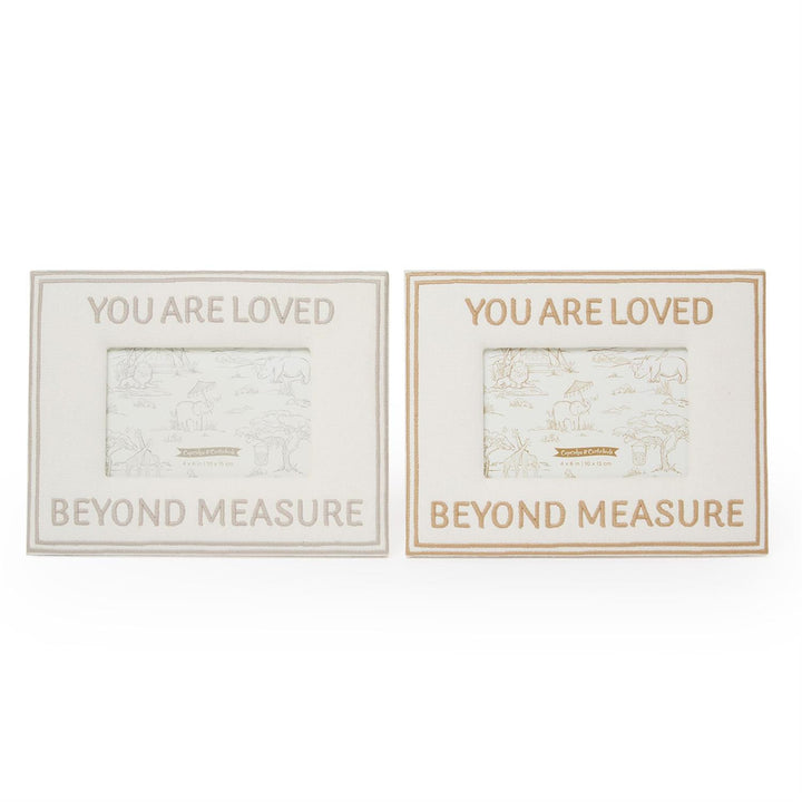 Two framed prints with 'You are loved beyond measure' text on a white background