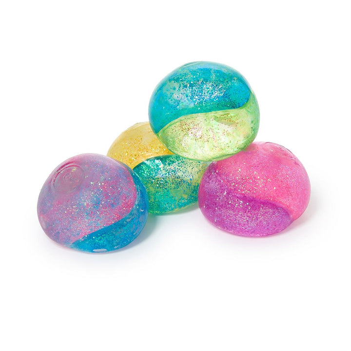Colorful glittery balls on a white background