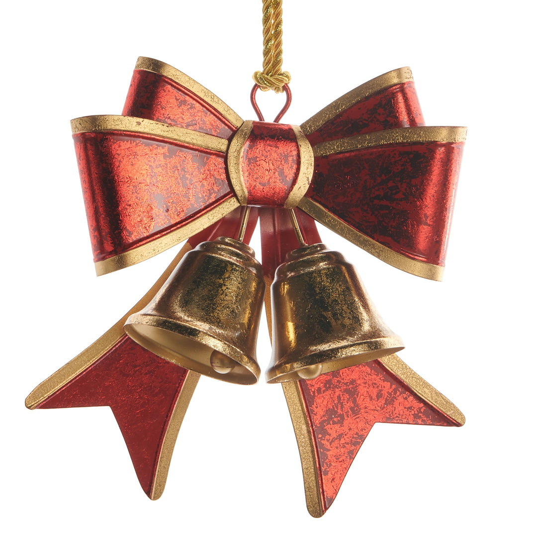 Decorative ornament with red bow and gold bells on a white background