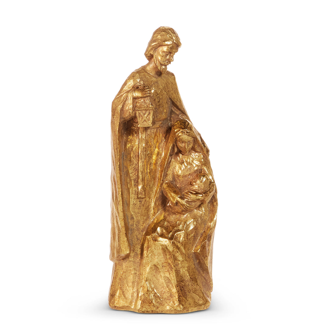 Gold statue of a religious figure with a child on a white background