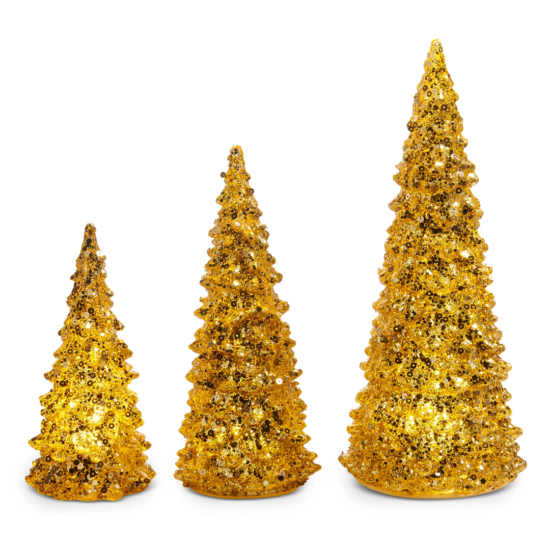 3 trees in different sizes covered in glitter gold and light up