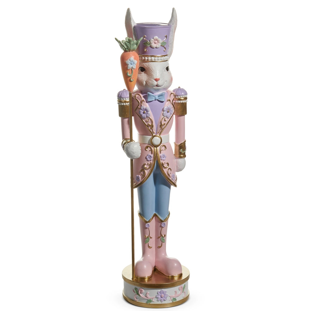 Pastel Easter bunny nutcracker holding carrot staff with floral details | Walker Boutique