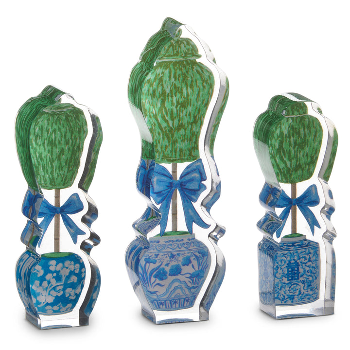Decorative topiary figures with green tops and blue vases on a white background