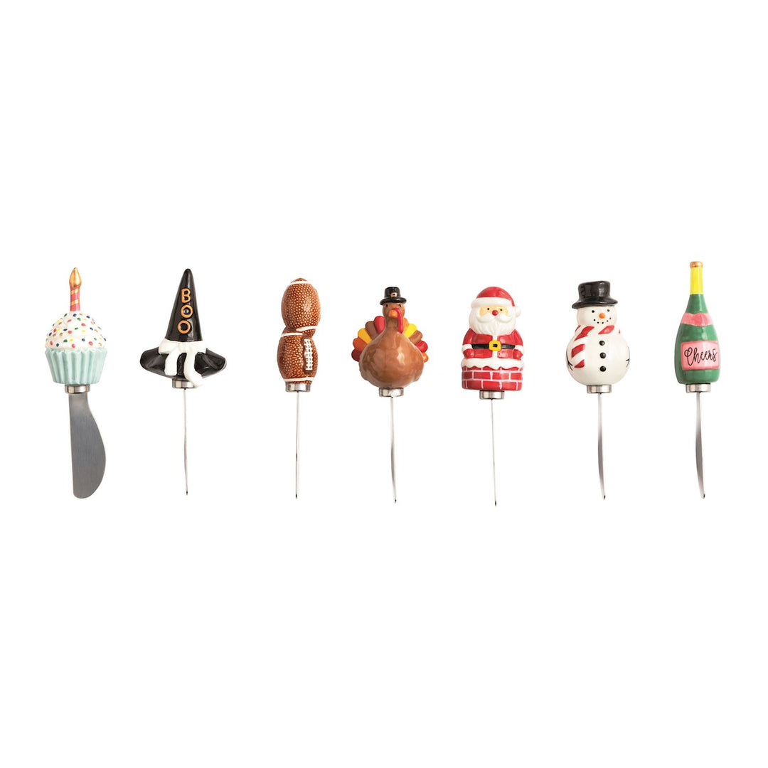assorted styles of cheese spreaders