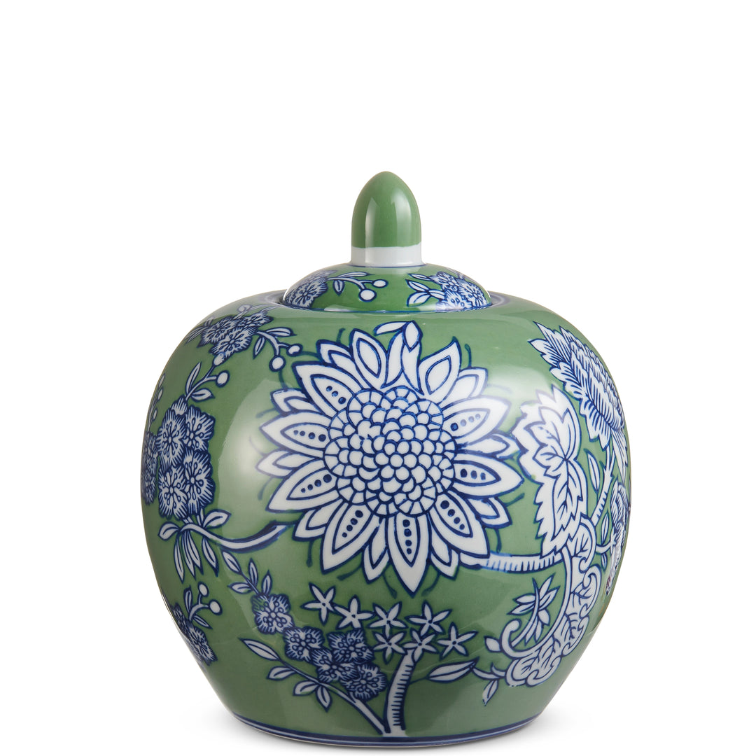 Green ceramic jar with blue floral patterns on a white background