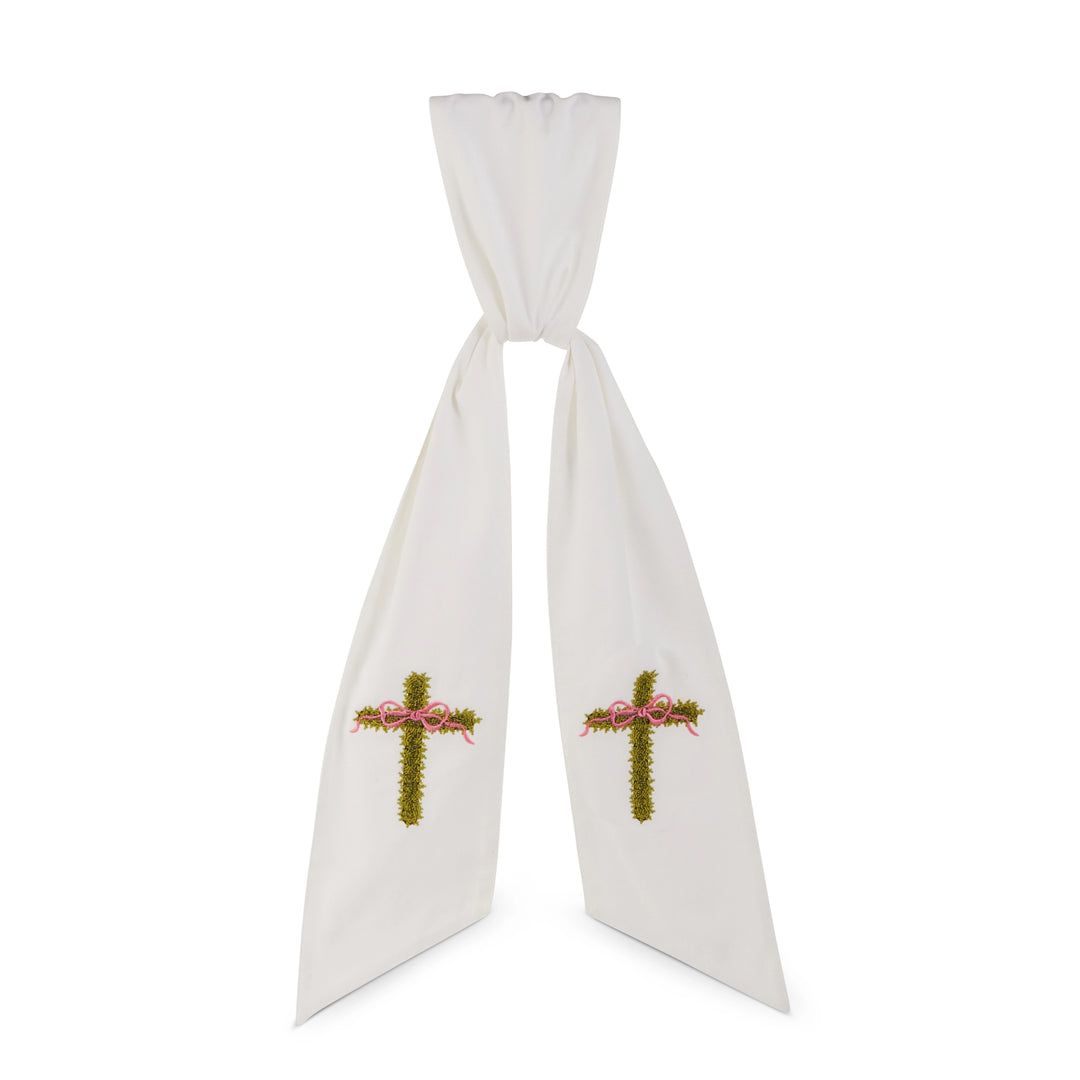 White tie with embroidered crosses on a white background