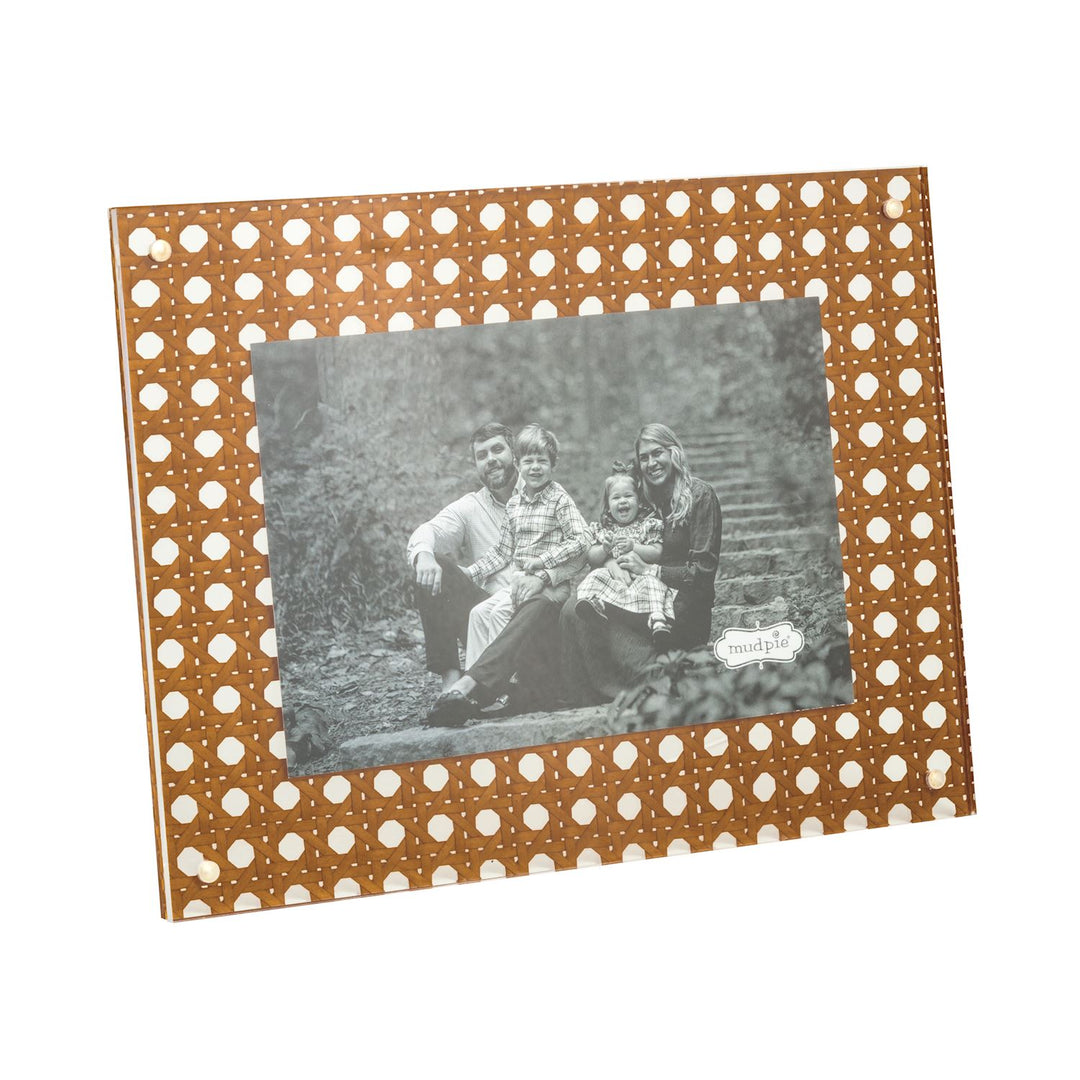 cane trellis print on picture frame with a vintage photo inside