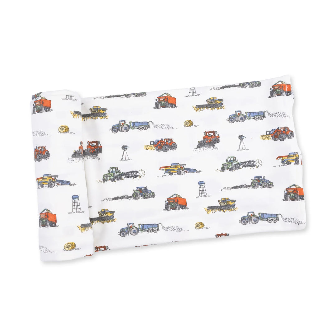 Angel Dear Farm Machines Swaddle Blanket displayed to show the full baby blanket and farm machines design