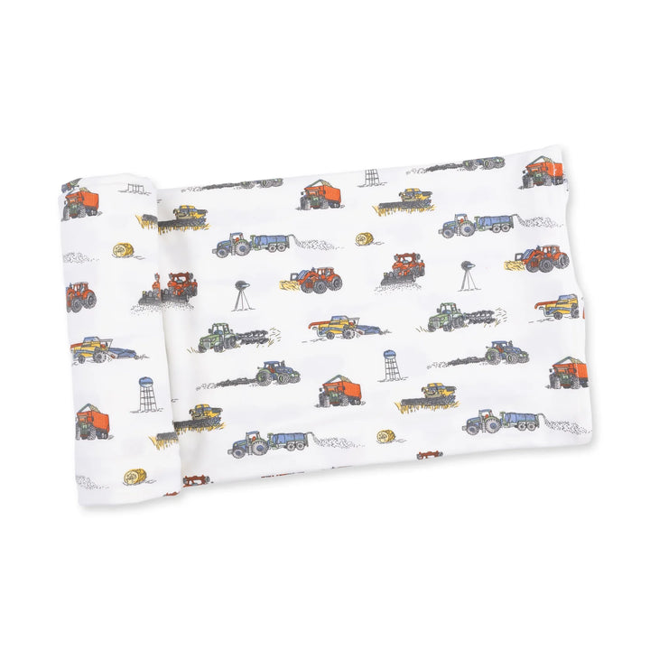 Angel Dear Farm Machines Swaddle Blanket displayed to show the full baby blanket and farm machines design