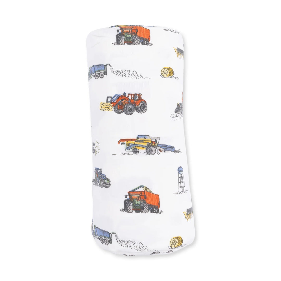 Angel Dear Farm Machines Swaddle Blanket close-up highlighting the farm machines design across the blanket