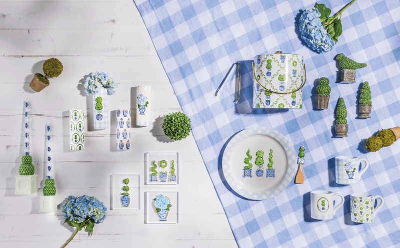 STYLED PHOTO WITH TOPIARY AND BOXWOOD BLUE AND WHITE VASES CUPS AND DISHES