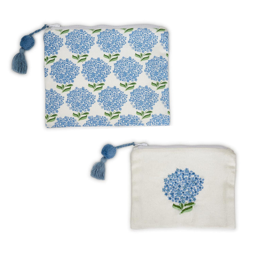 Two pouches with blue hydrangea patterns on a white background