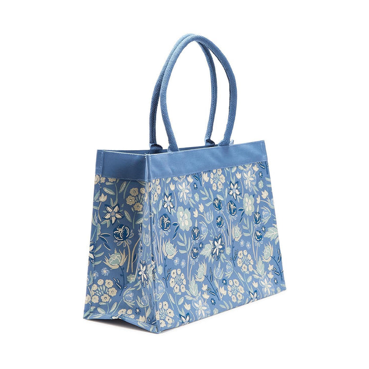 Blue floral-patterned tote bag on a white background