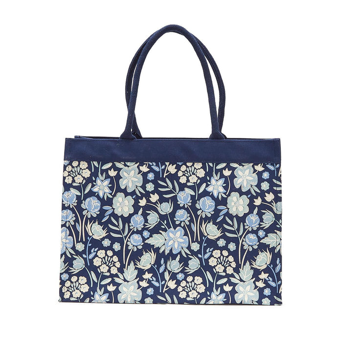 Navy tote bag with floral pattern on a white background