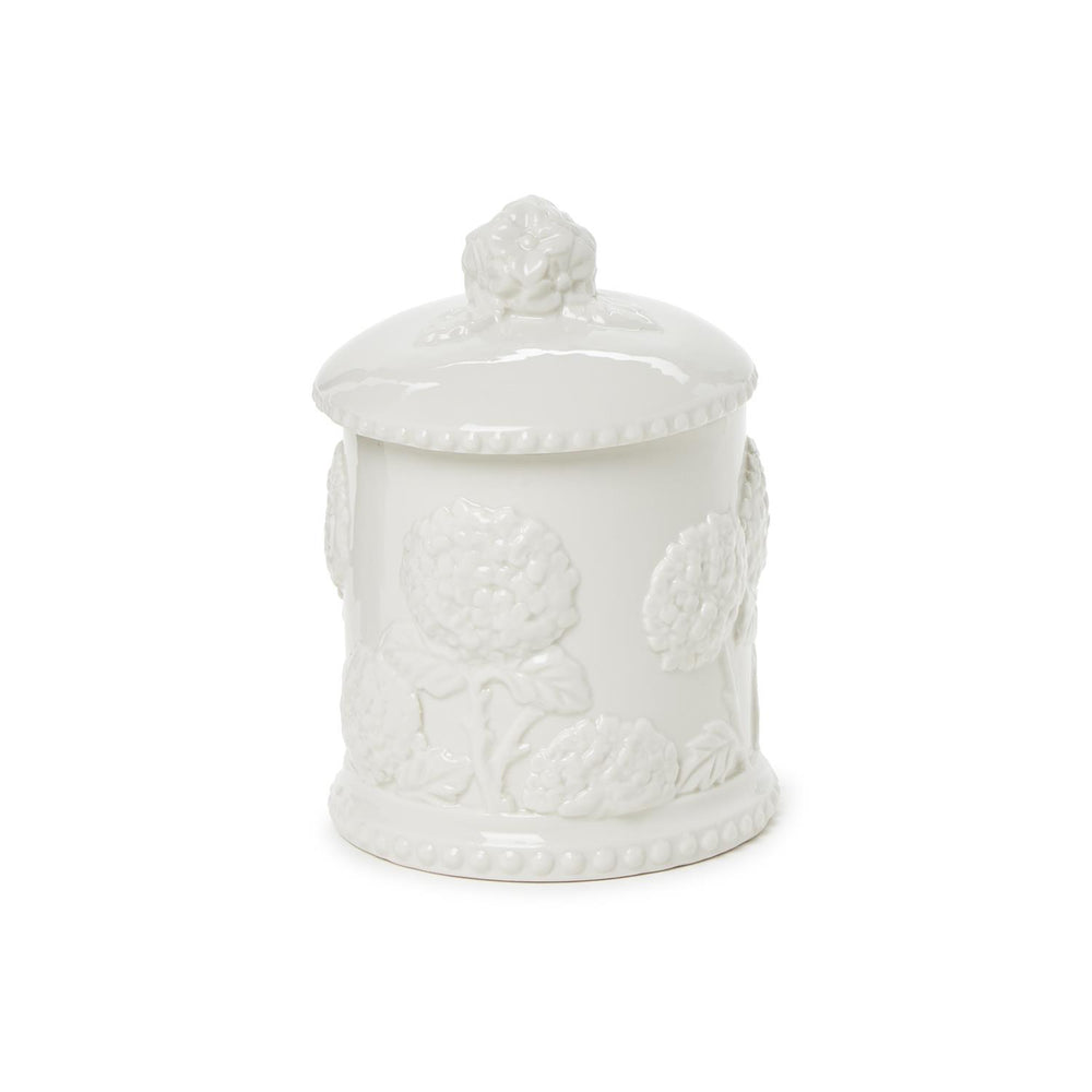 White ceramic jar with lid on a white background