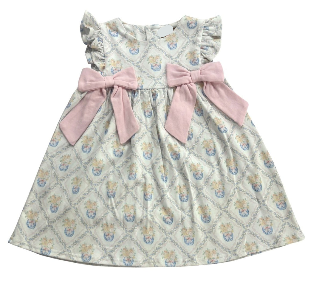 LIGHT MUTED COLORED DRESS WITH FLORAL PATTERN AND PINK BOW DETAIL