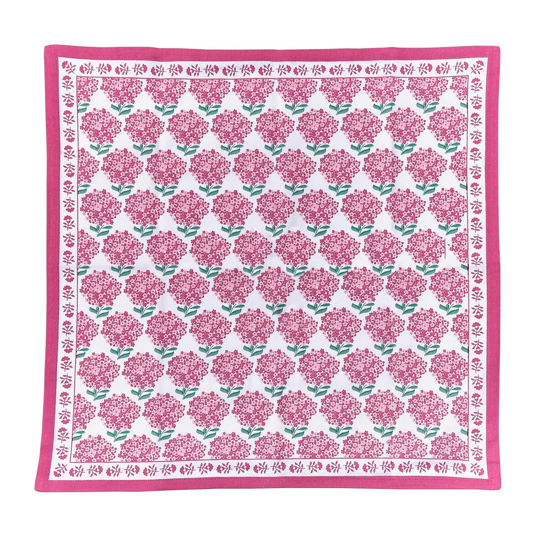 Floral patterned fabric square with pink flowers on a white background
