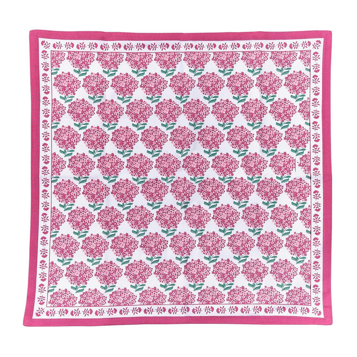 Floral patterned fabric square with pink flowers on a white background