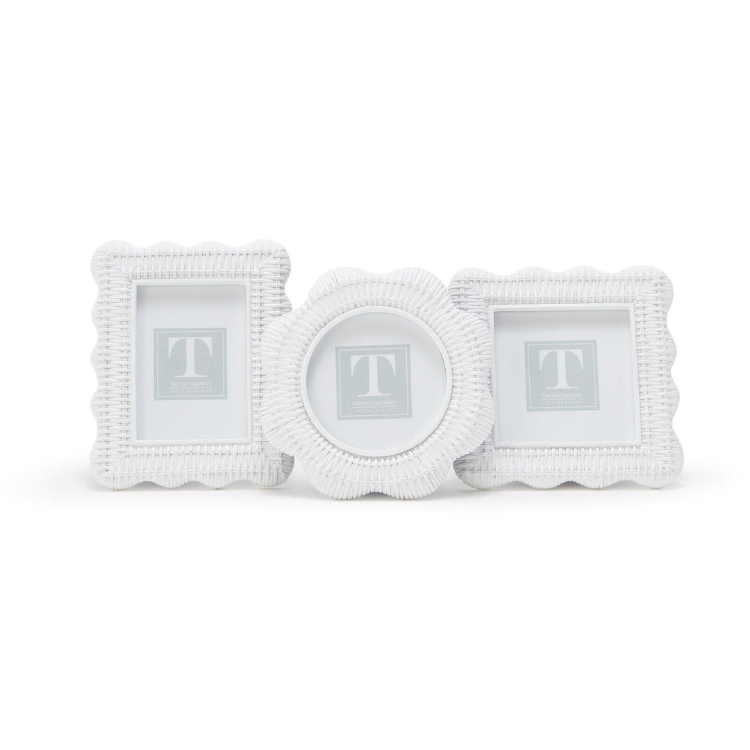 Set of three white decorative frames with letter 'T' on a white background