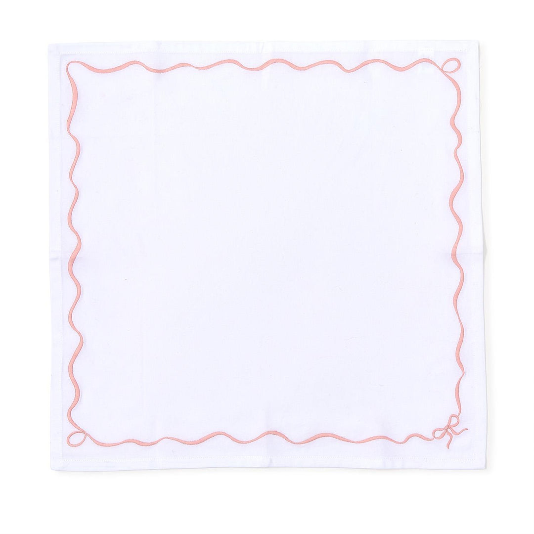 White paper with a pink decorative border on a white background