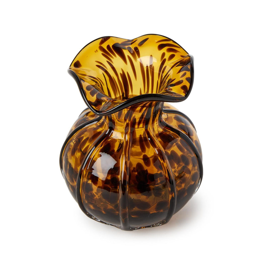 Tortoiseshell-patterned glass vase on a white background