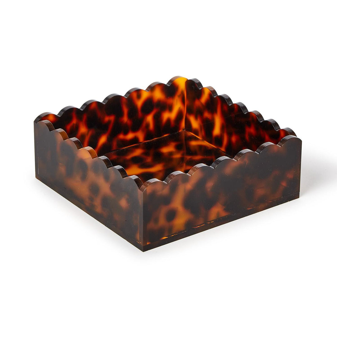Tortoiseshell patterned square container on a white background