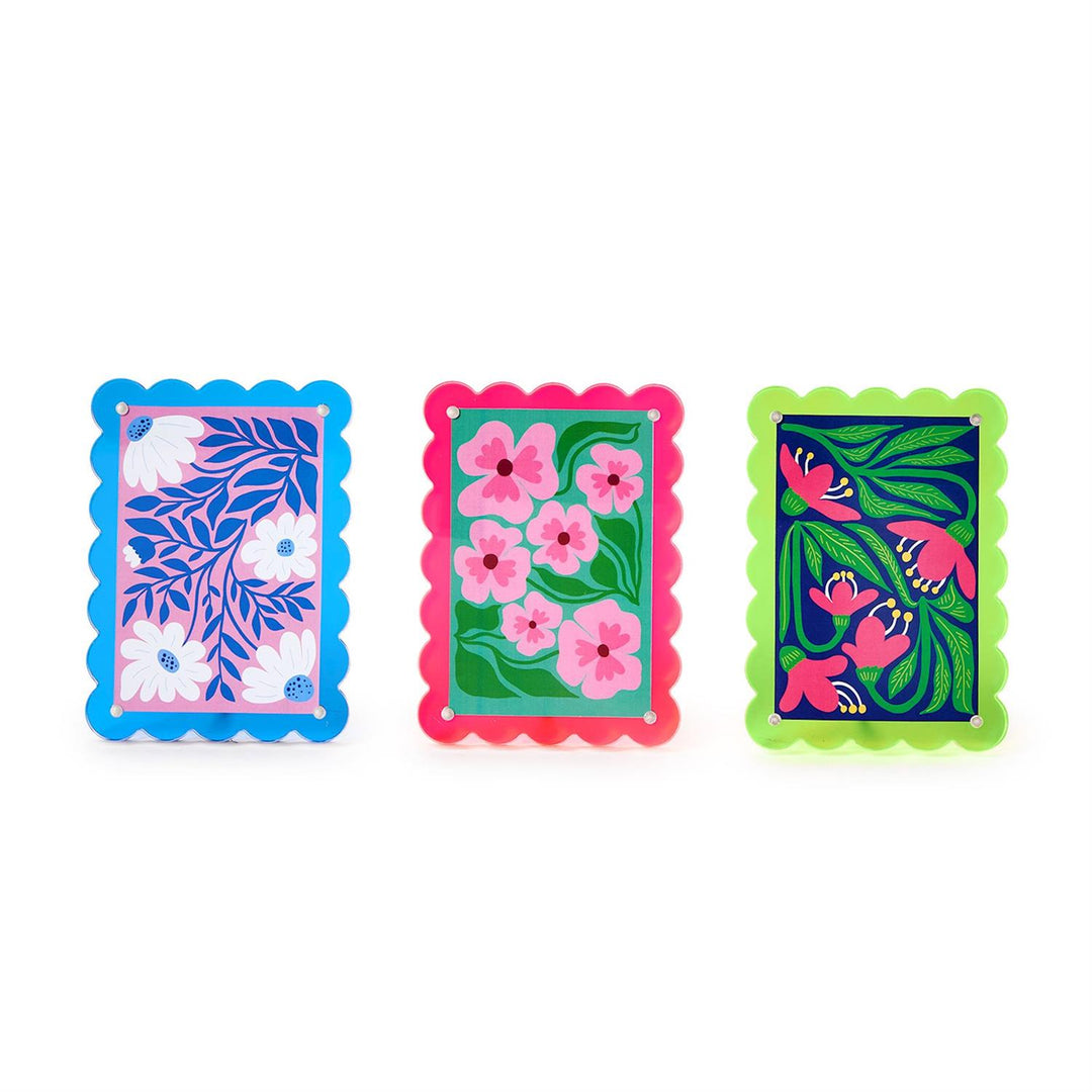 Three rectangular decorative items with floral patterns on a white background