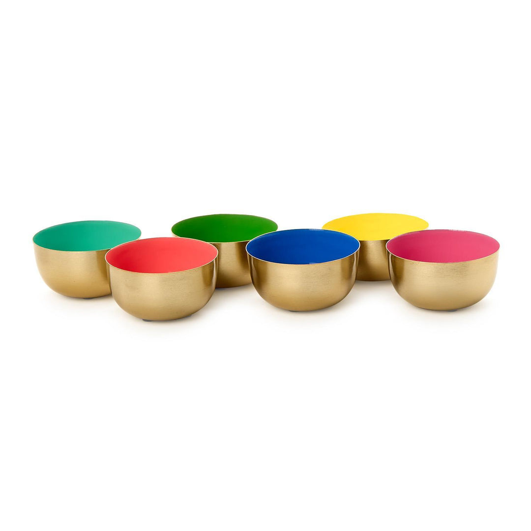 Set of colorful metal bowls on a white background