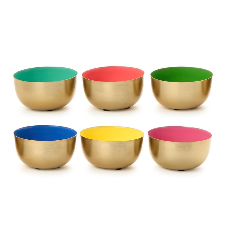 Set of six colorful bowls with gold exteriors on a white background