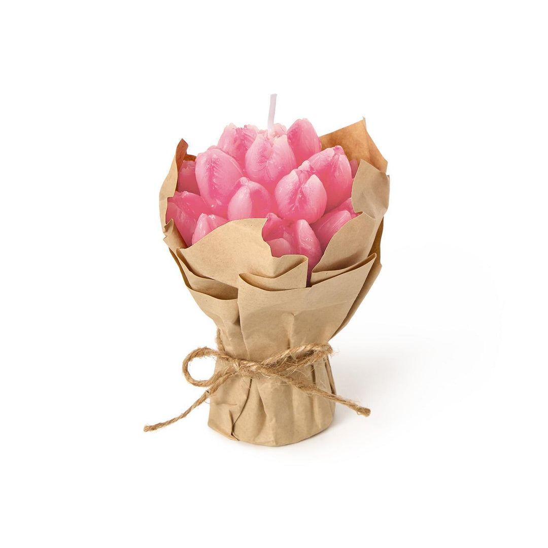 Pink candle shaped like a bouquet wrapped in brown paper on a white background