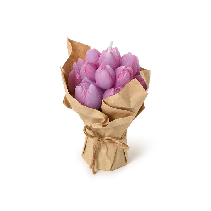 Bouquet of pink tulip-shaped candles wrapped in brown paper on a white background