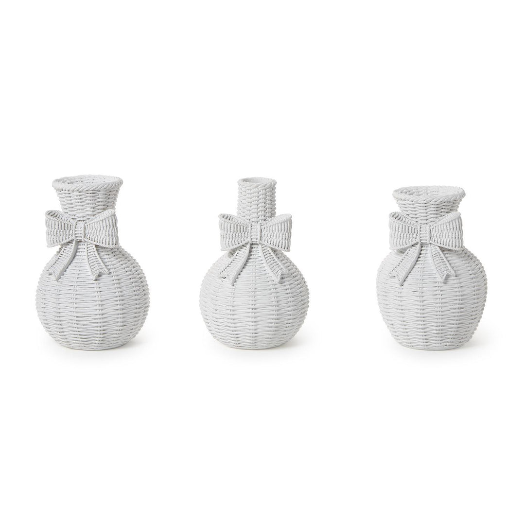 Three woven vases with bow accents on a white background