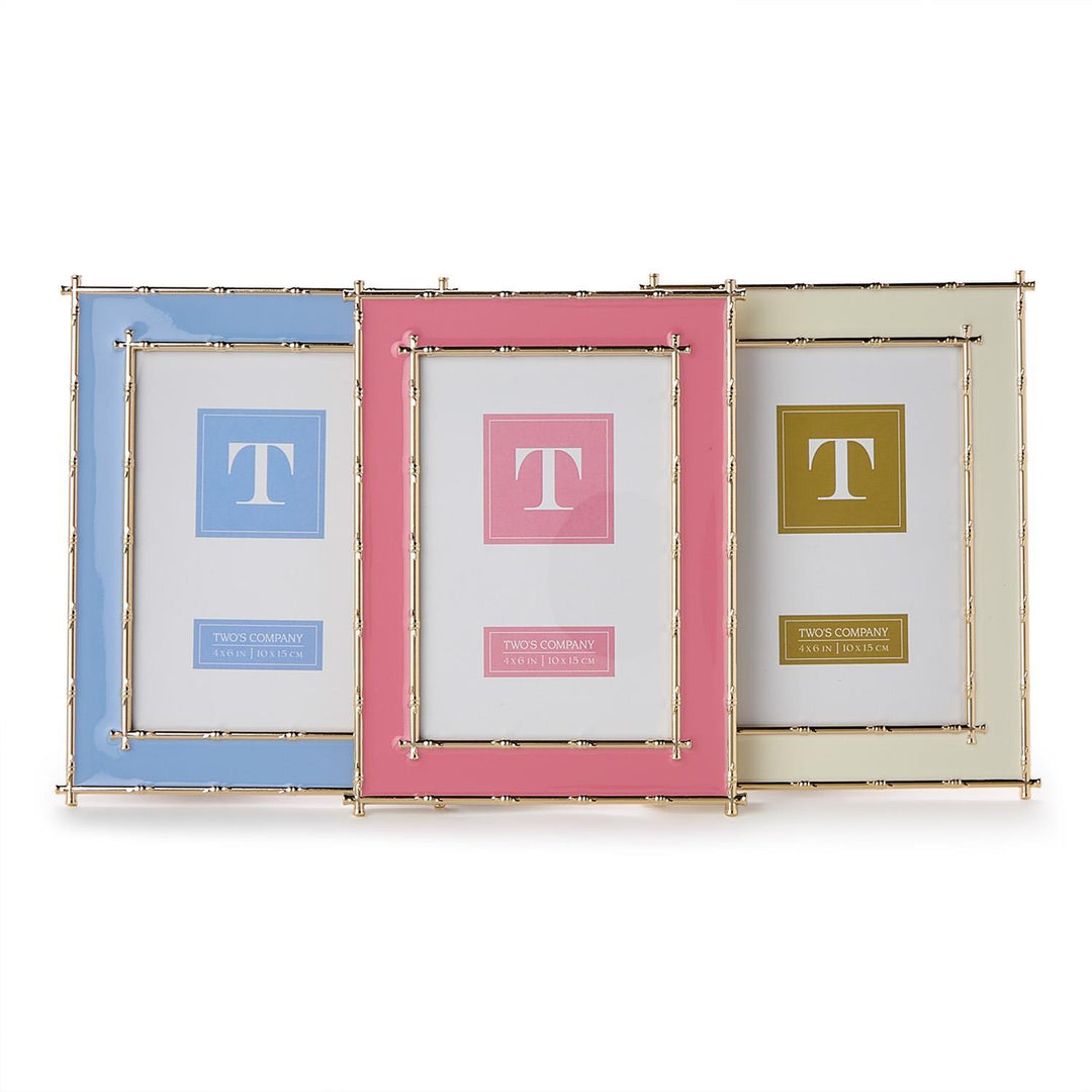 Three picture frames with different colored borders on a white background